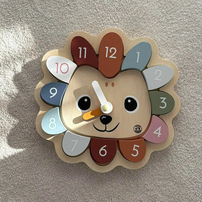 Children's clock with a hedgehog design on a light gray background