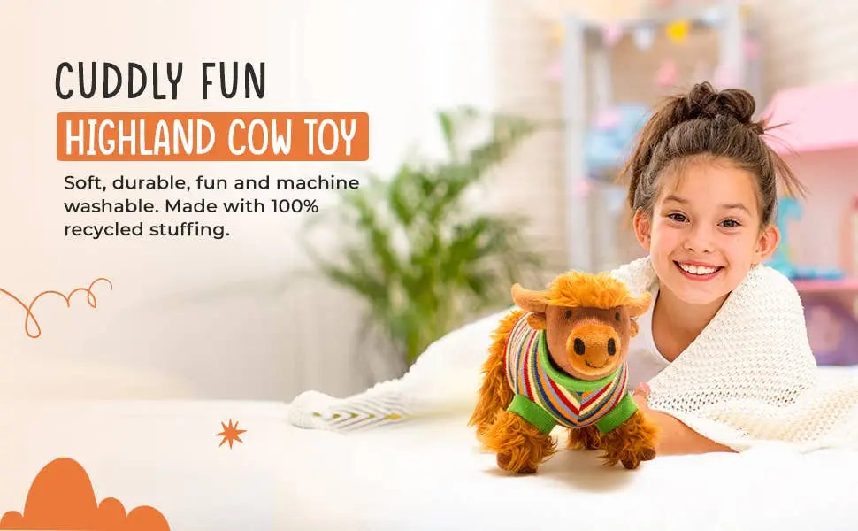 Child with a Highland cow toy in a cozy indoor setting
