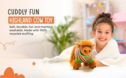 Child with a Highland cow toy in a cozy indoor setting