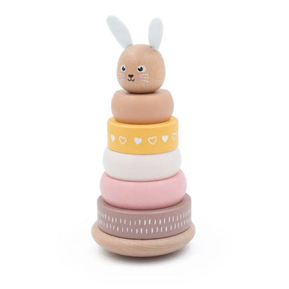 Stack of colourful wooden rings with a bunny design on a white background