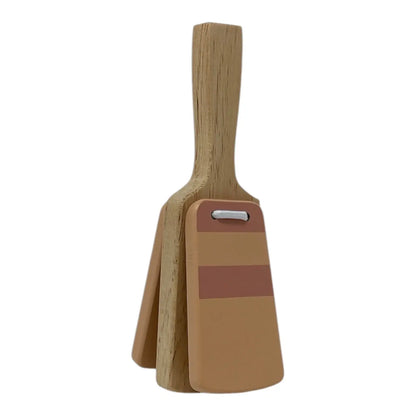 Wooden clapper with natural wood handles and tan bristles, one featuring a reddish-brown stripe and a small silver metal loop at the top, shown on a plain white background.