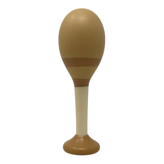 A wooden toy maraca or tambourine with a rounded tan head, a medium brown band around the middle, and a light natural wood handle on a white background.