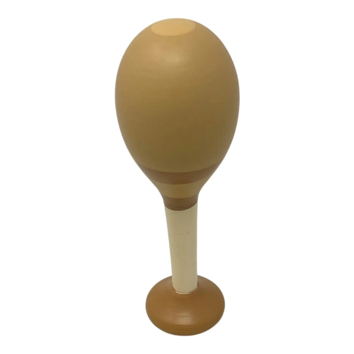 A wooden maraca with a rounded, egg-shaped head in a warm brown tone, a cream-colored shaft, and a circular base, shown against a plain white background.