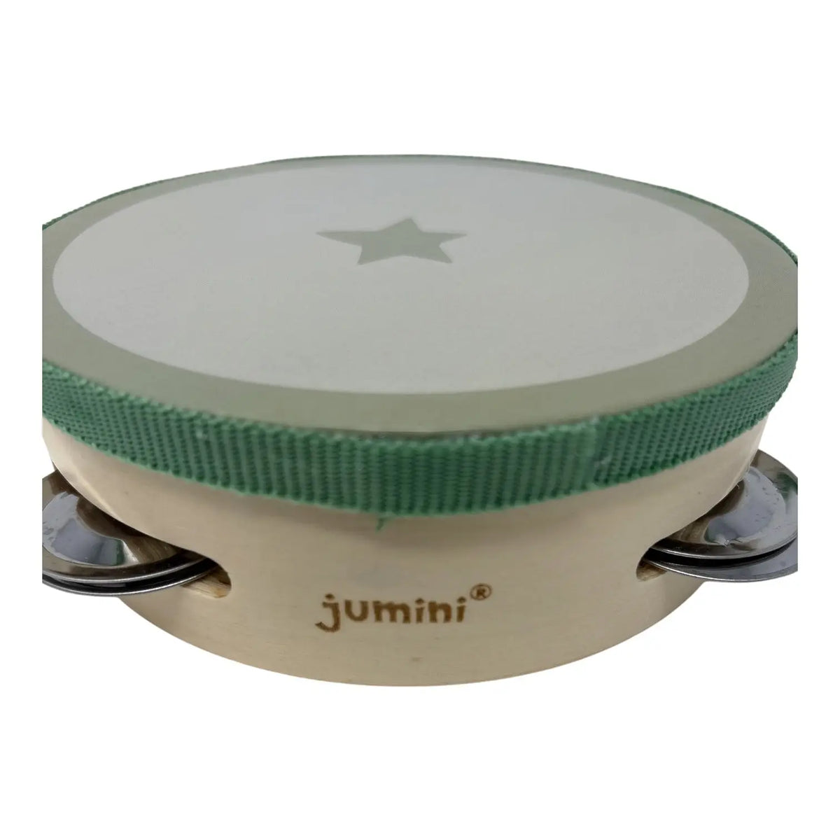 A small wooden tambourine with a light beige body, a green fabric trim around the drum head, and a light beige drum head featuring a star cutout. The brand name 'jumini' is printed on the side.