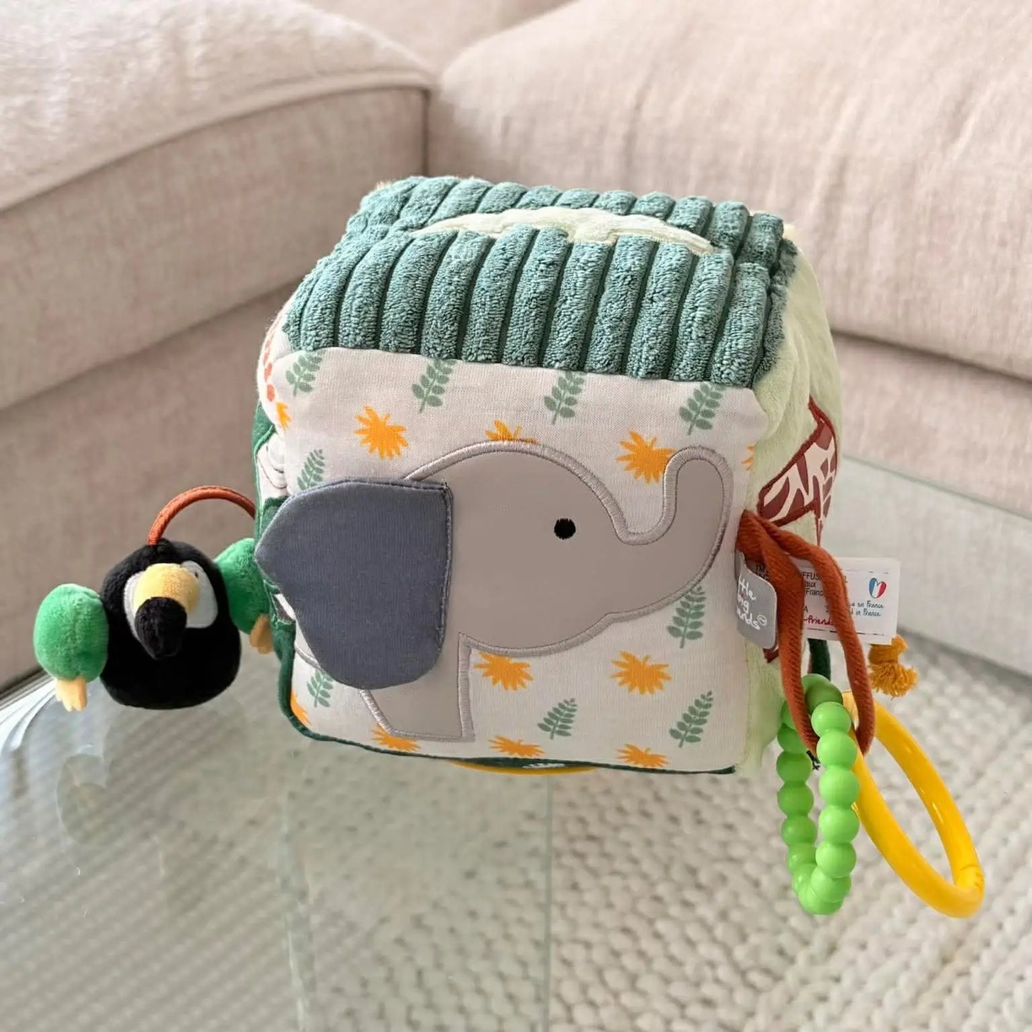 Children's toy with elephant design on a couch