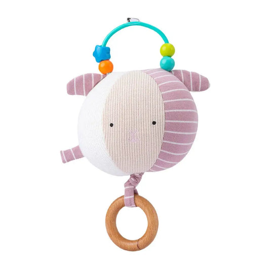 A baby sensory toy shaped like a sheep, featuring a round body with pink and white stripes, a textured cream face, a wooden teething ring, and a turquoise hanging arch with colourful beads.