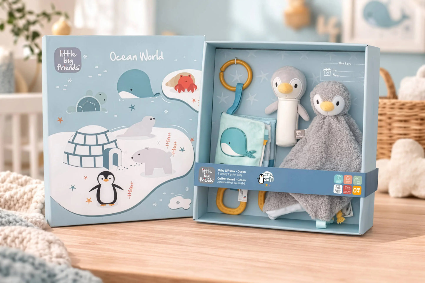 Baby gift set with penguin-themed toys and plush in a box labeled 'Little Big Friends Ocean World'.