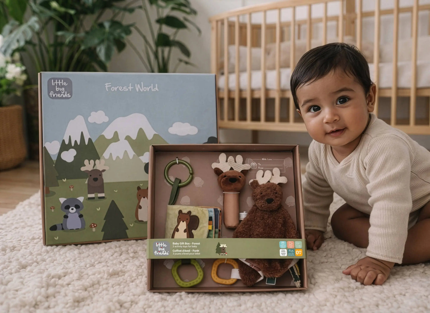 Baby playing with a 'Little Forest World' toy set in a nursery setting