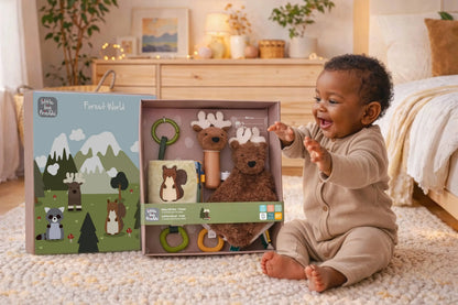 Baby playing with toys from a 'Forest World' toy set in a cozy room.