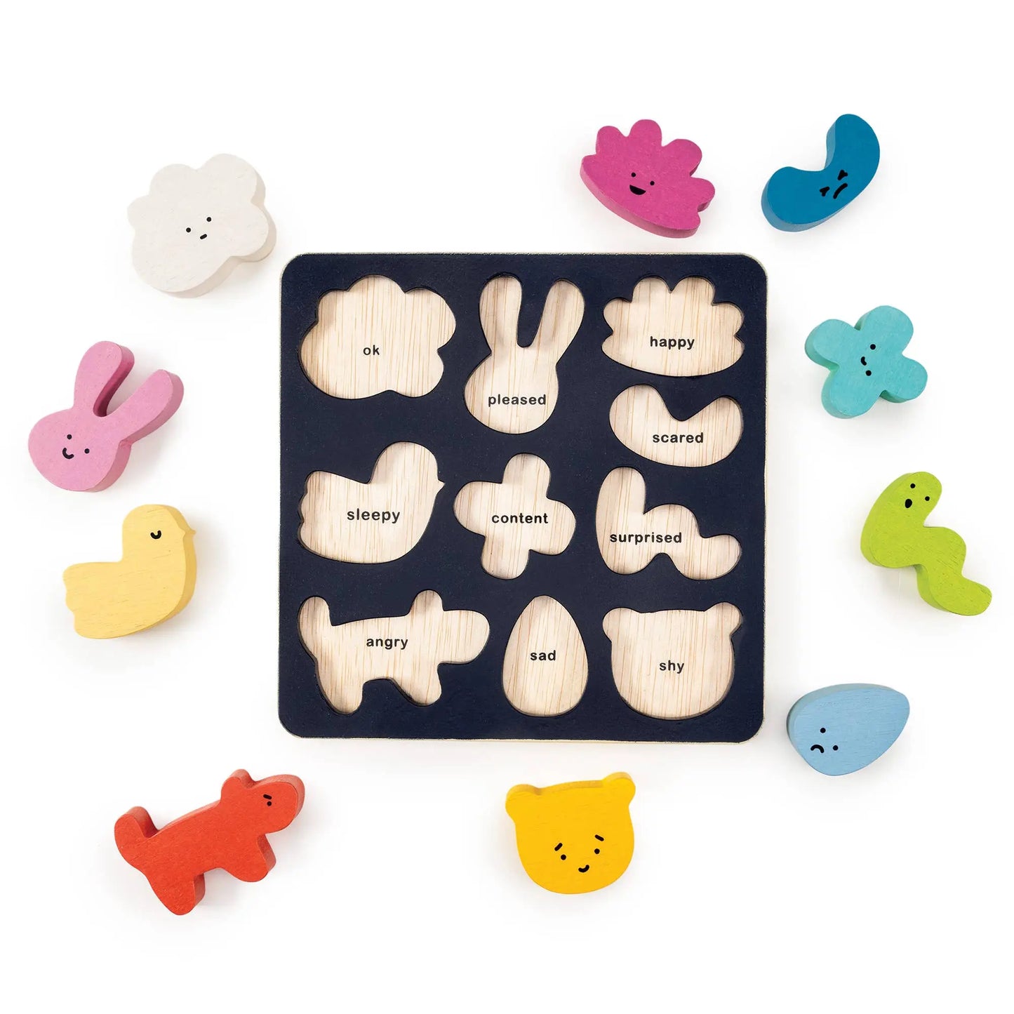 Wooden mood board with a variety of different emotions and shapes