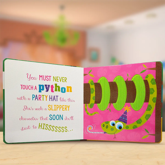 An open children's board book with a colourful printed scene on the right showing a green snake wearing a party hat on a pink background, and text on the left saying not to touch a party-hat python. The book is photographed on a light wood surface with a softly blurred indoor background.