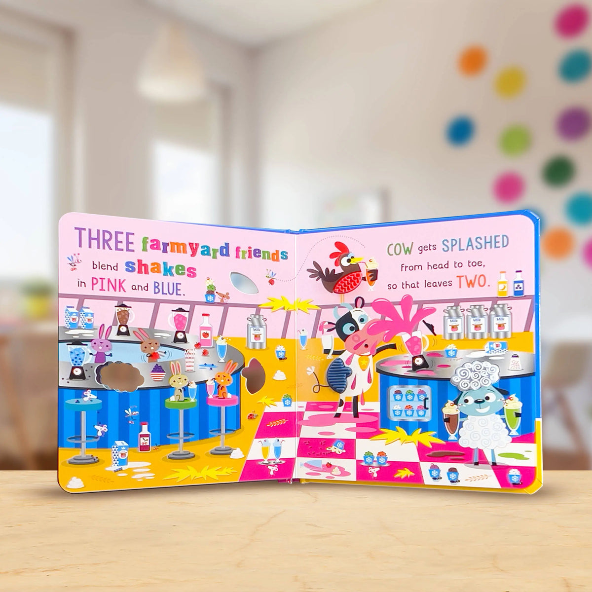 Children's book with colourful illustrations on a wooden surface
