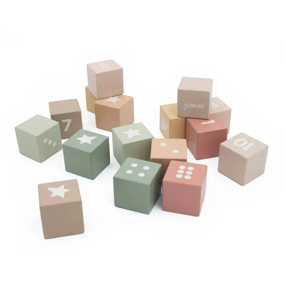 Set of colourful wooden blocks with numbers and stars on a white background