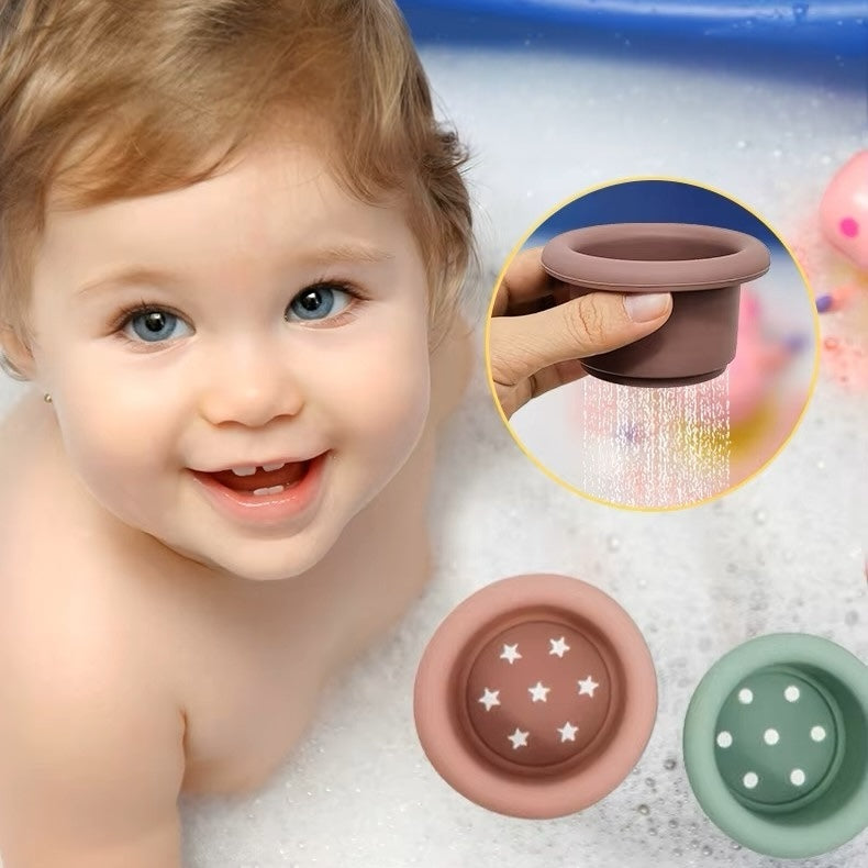 Baby playing with silicone toy in bath
