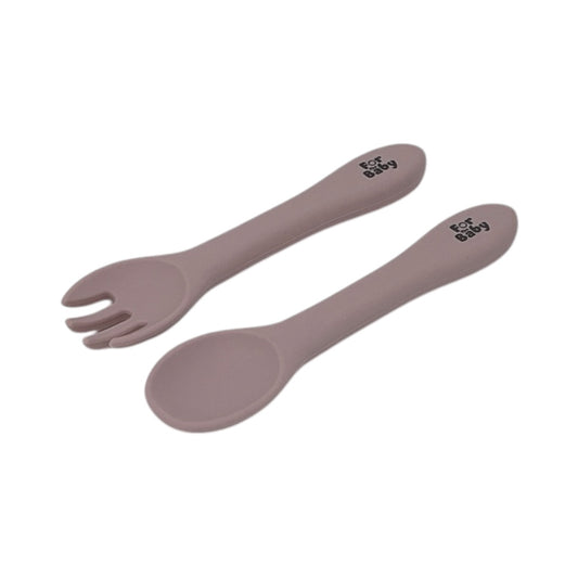 Toddler silicone fork and spoon set in soft, food-grade silicone, designed for safe and independent eating.