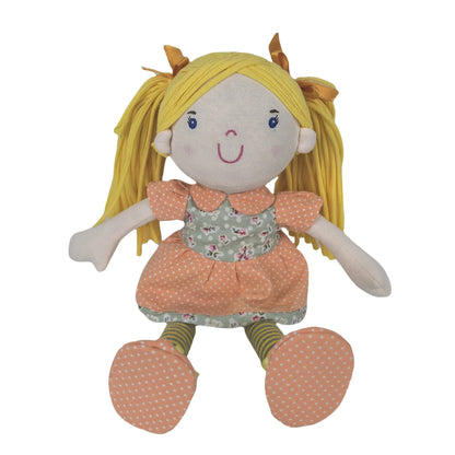 Plush toy with blonde hair and a floral dress on a white background