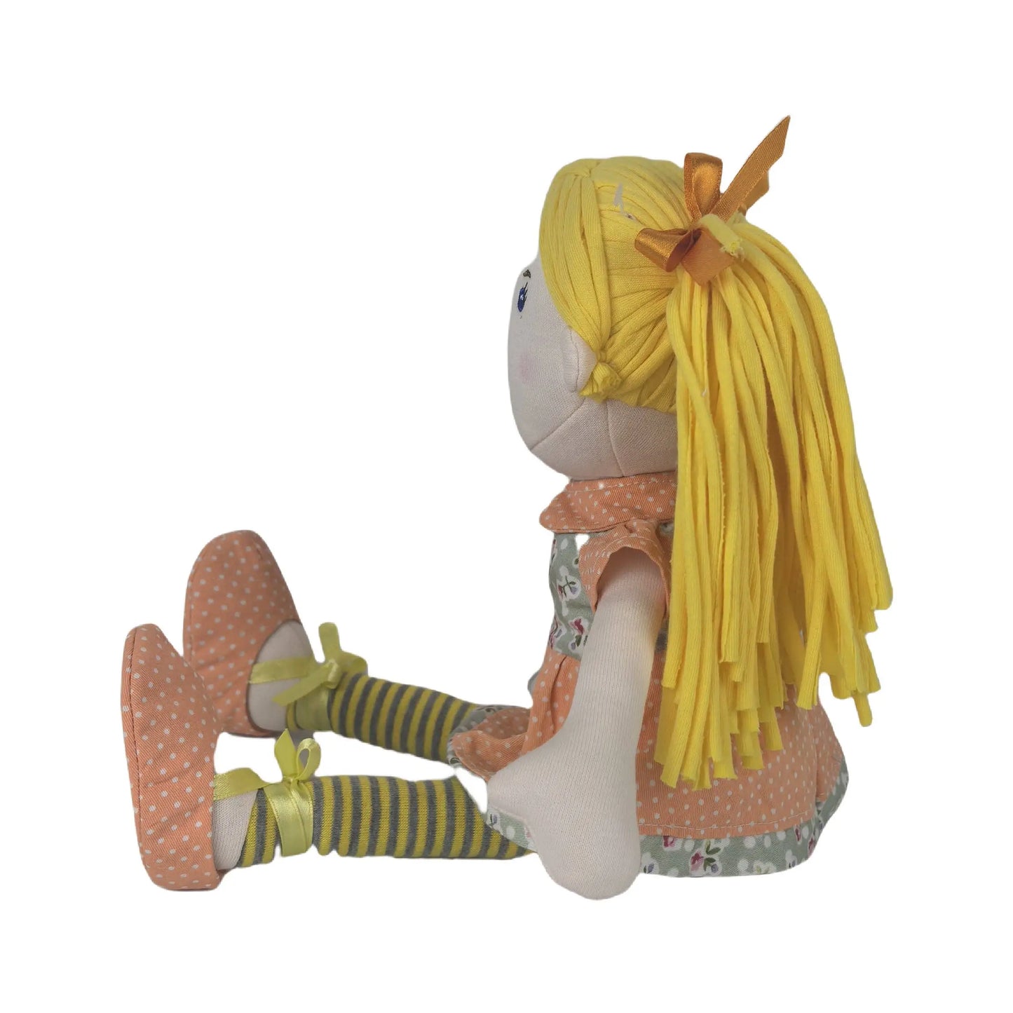 Plush toy with yellow hair and striped outfit on a white background