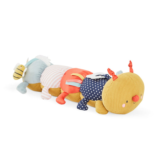 Colourful caterpillar-shaped plush toy on a white background