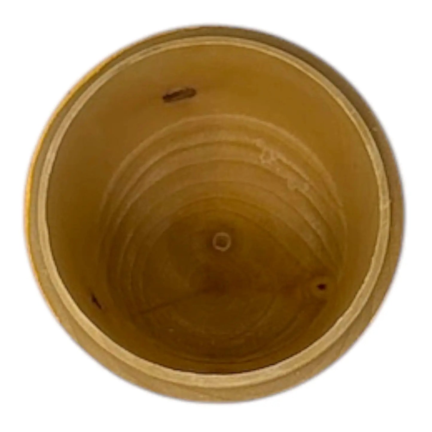 Brown wooden inside of a stacking doll toy on a white background