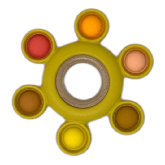 Colourful popper toy with six coloured sections on a white background