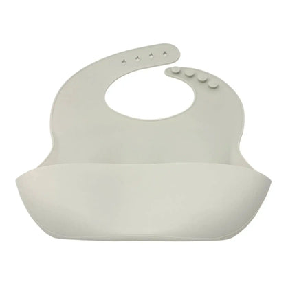Grey silicone bib on a white background