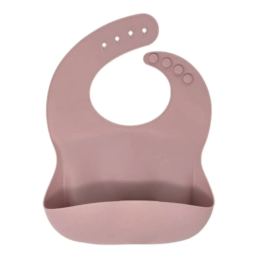 Pink silicone bib on a white background