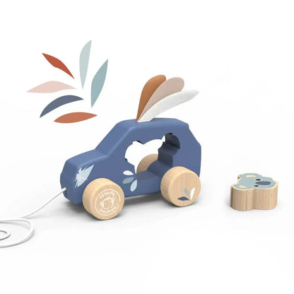 Wooden toy car with rabbit design on a white background