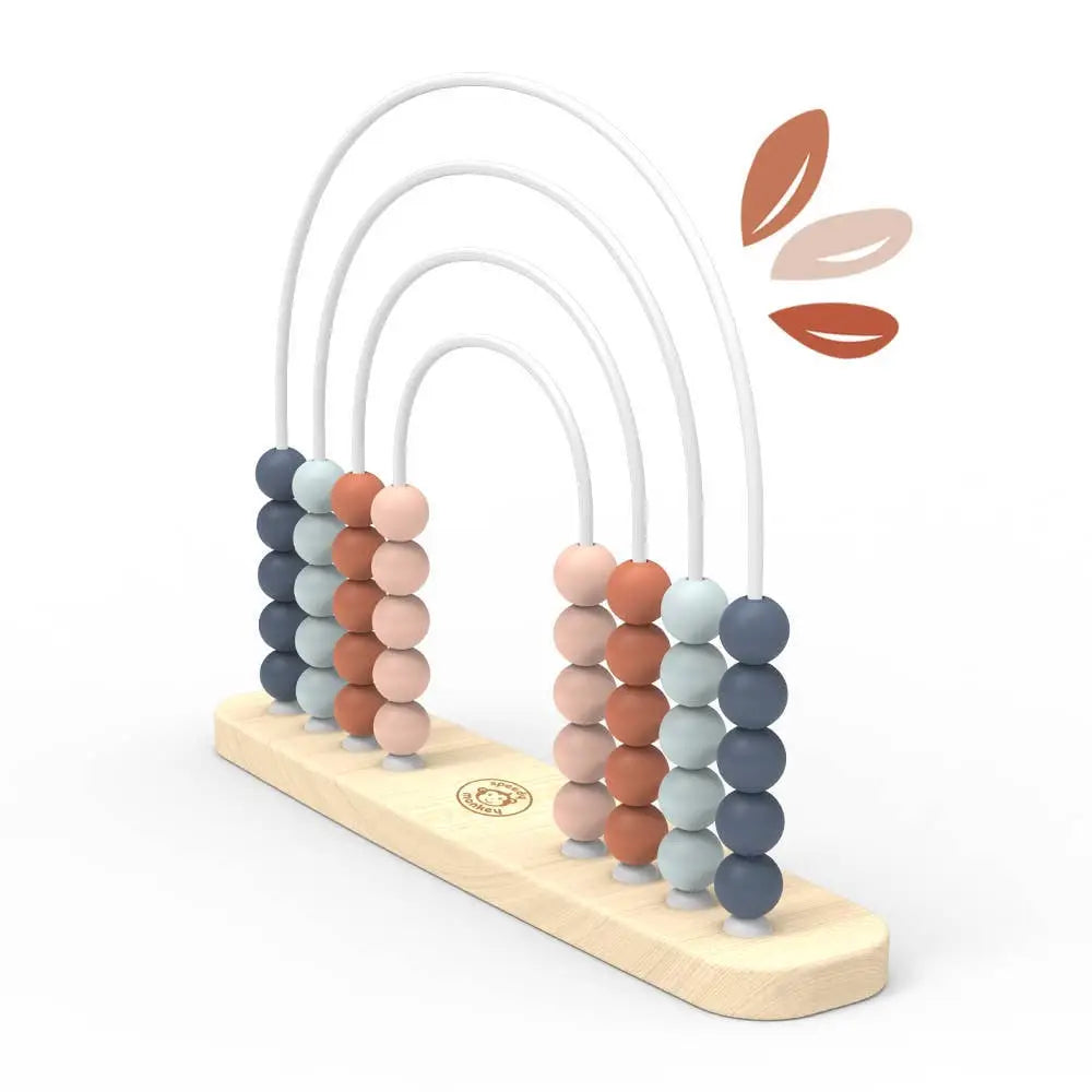 Colourful beaded abacus toy with wooden base on a white background