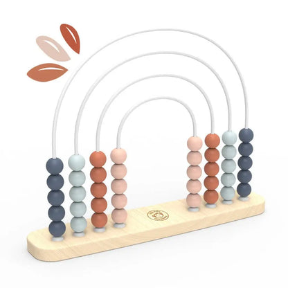Colourful wooden abacus toy on a white background
