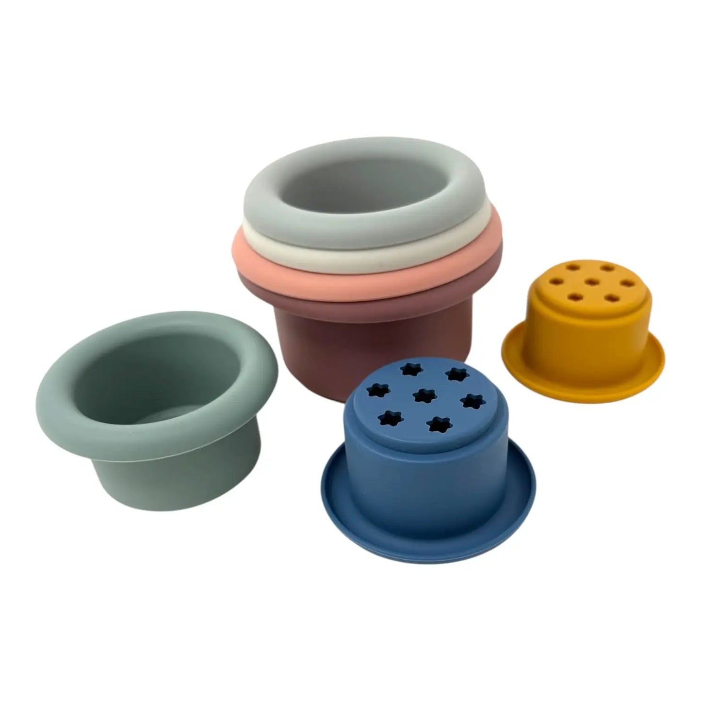 Set of colourful silicone stacking cups on a white background