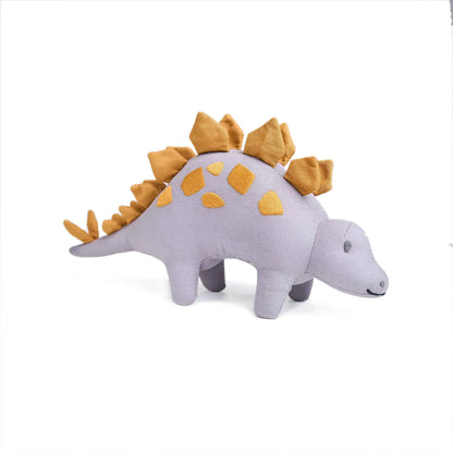 Plush toy dinosaur with yellow spikes on a white background