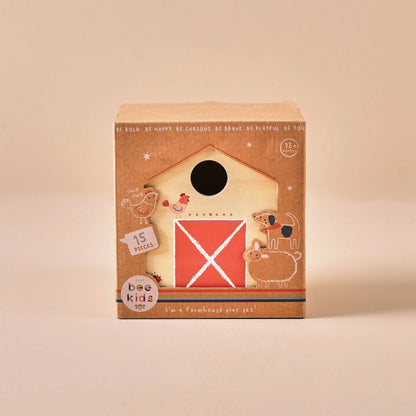 Box of a farm-themed play set with illustrations on a beige background