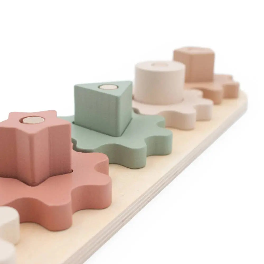 Colourful geometric wooden blocks on a white background