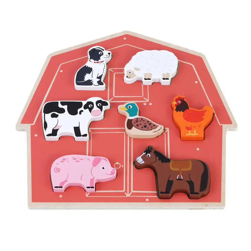 Set of wooden farm animal figures on a pink board with a house design.