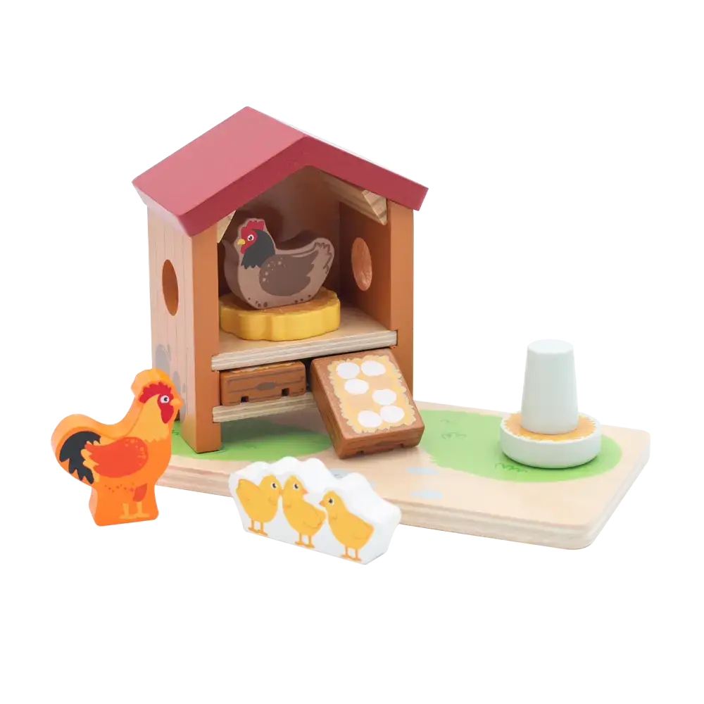 Wooden toy farm set with chicken coop, chickens, and chicks on a white background