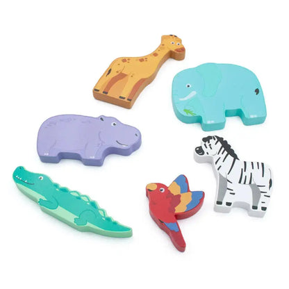 Set of colourful wooden animal toys on a white background