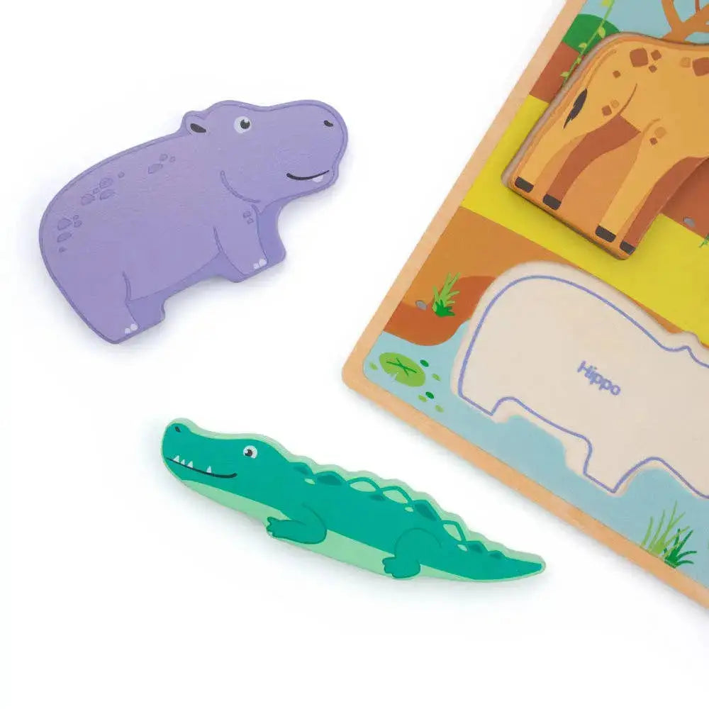 Hippo and crocodile-shaped toys with a wooden puzzle featuring animals on a white background