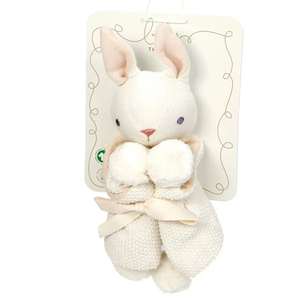 White plush bunny toy with a bow on a white background