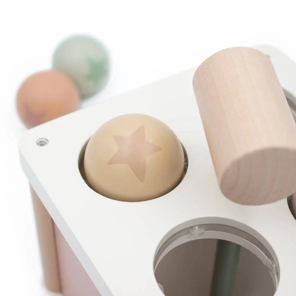 Children's educational toy with wooden and plastic components on a white background