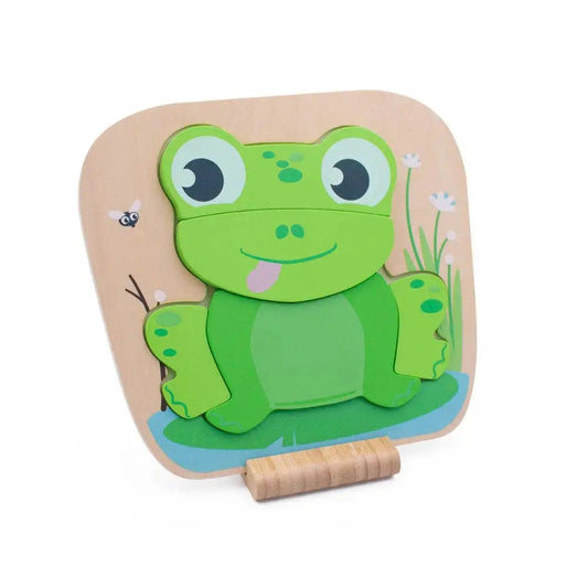 Wooden toy with a green frog design on a beige background