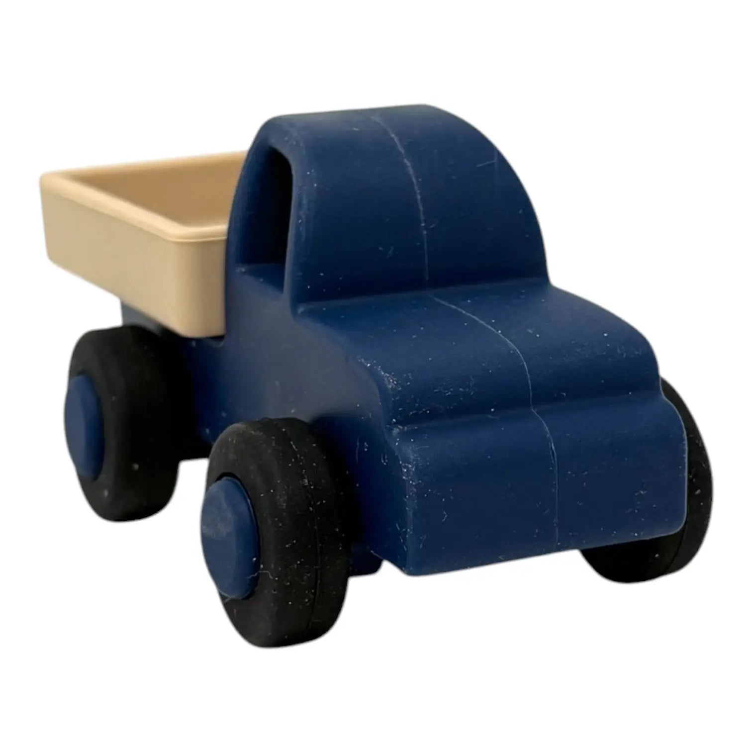 Blue toy truck with a beige bed on a white background