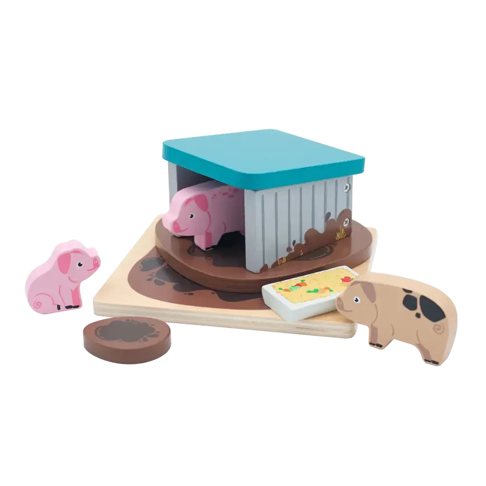 Wooden toy set with pigs and a barn on a white background
