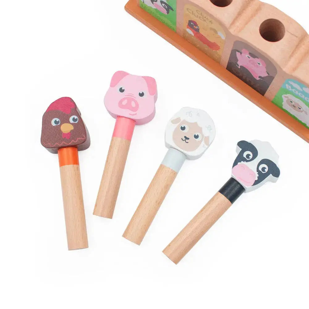 Set of wooden animal-shaped hammers with a storage box on a white background