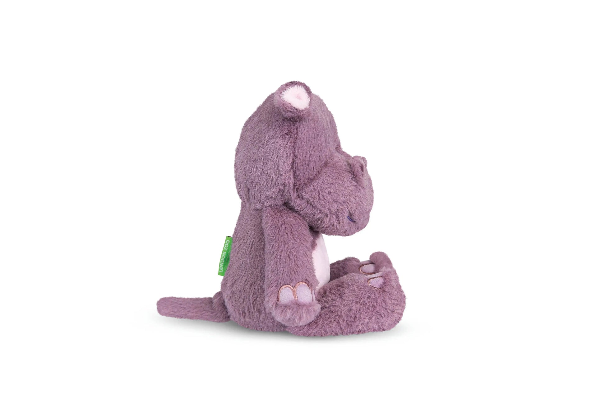 Purple plush toy hippo on a white background
