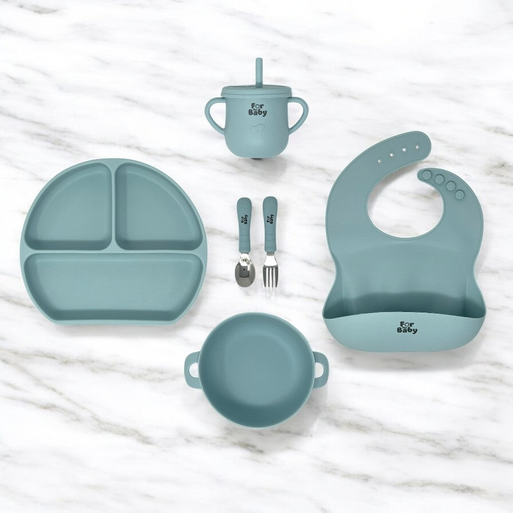 6 piece silicone baby feeding set on marble counter top