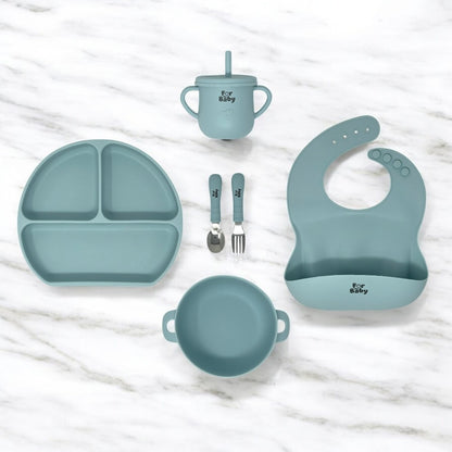 6 piece silicone baby feeding set on marble counter top