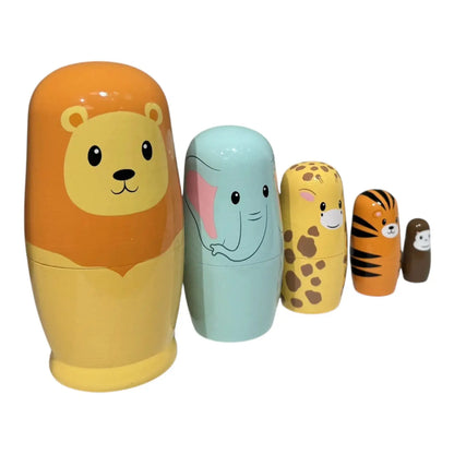 Set of five nesting dolls with animal designs on a white background