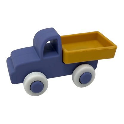 Toy truck with blue body and yellow bed on a white background