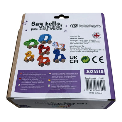 Box of push along toys with colourful animals on a white background