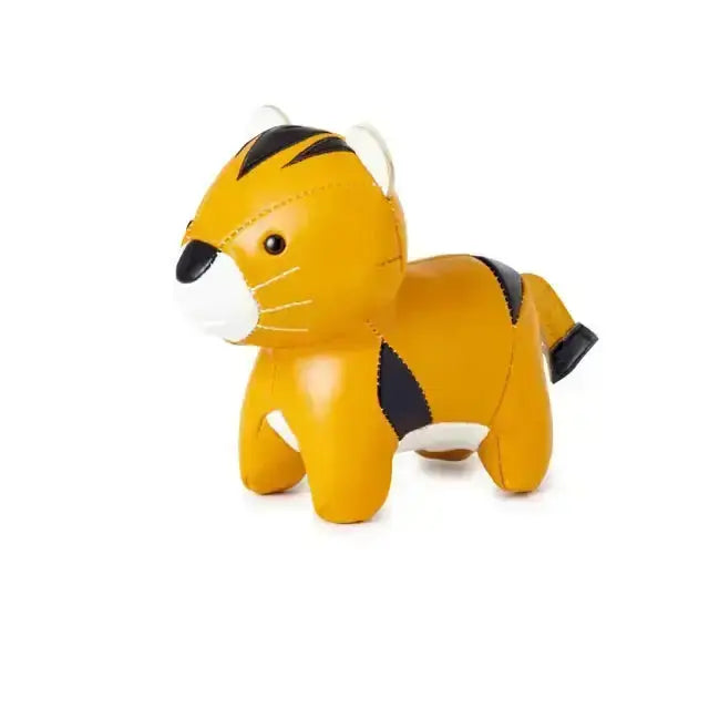 Yellow tiger-shaped toy on a white background
